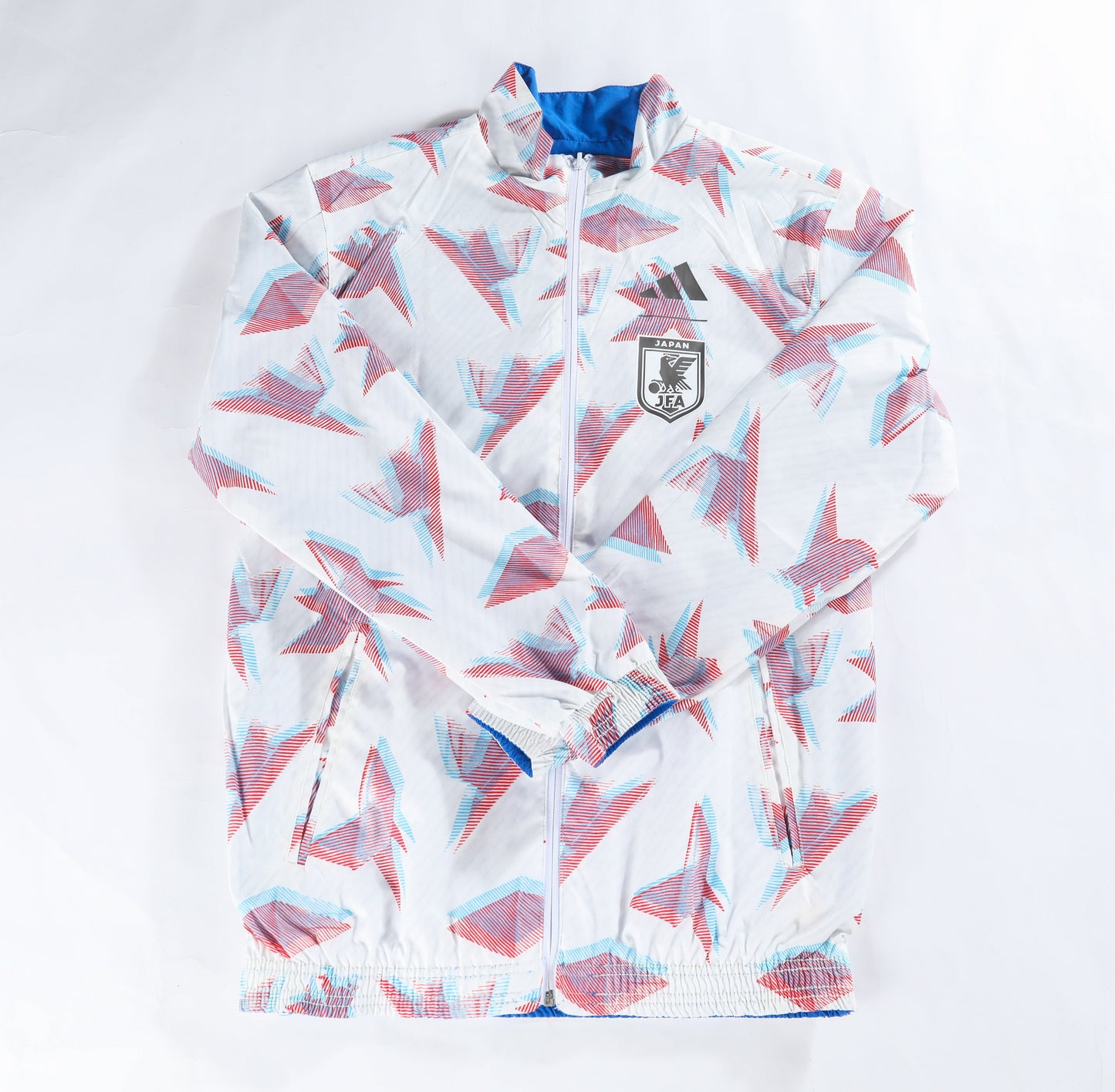 Cortavientos reversible Japón (blanco y azul)